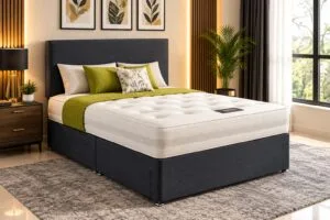 Luxury dark grey divan bed with white mattress and green bedding in modern bedroom