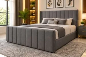 Luxury grey upholstered bed with tall headboard and matching padded footboard